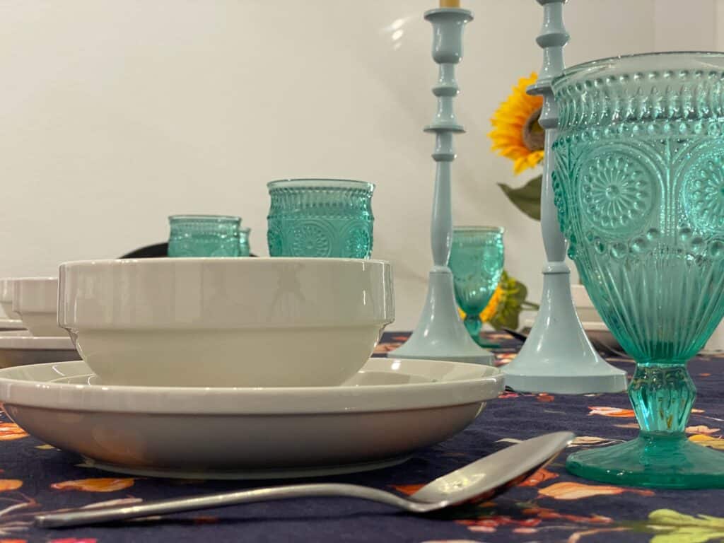 Affordable fall decor idea: buy white porcelain dishes to complement your autumn table linens. 
