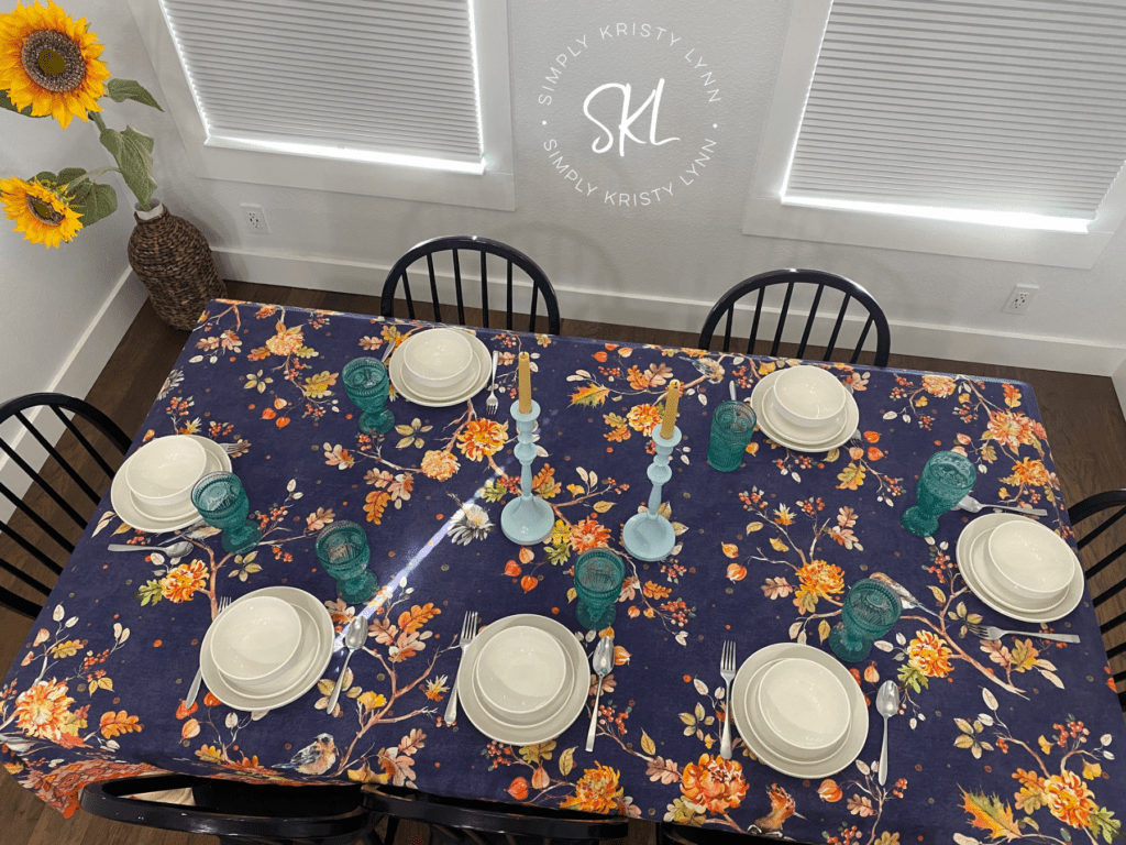 Autumn table cloth + white porcelain dishes.